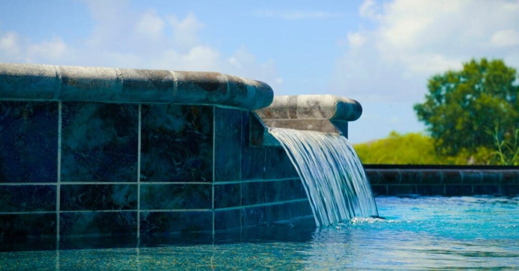 5 Stunning Pool Waterfalls to Elevate Your Backyard Oasis, spa spillover